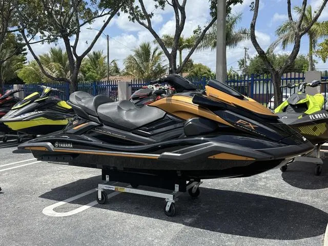 Slide: The Image of 2024 Yamaha WaveRunner FX Limited SVHO with audio system, parked outdoors under trees. - 3