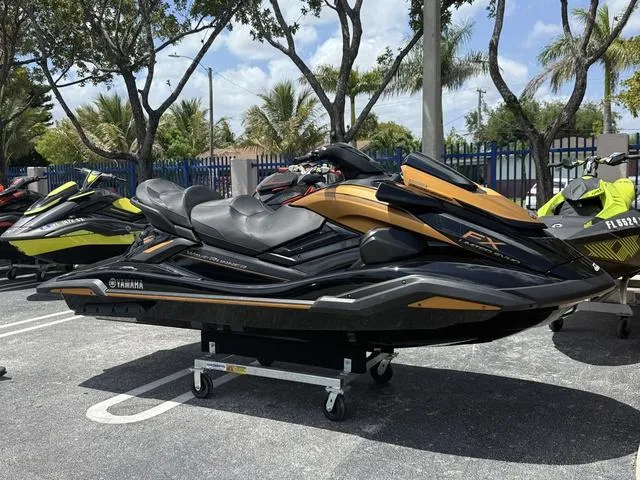 Slide: The Image of 2024 Yamaha WaveRunner FX Limited SVHO with Audio System, parked outdoors under trees. - 4