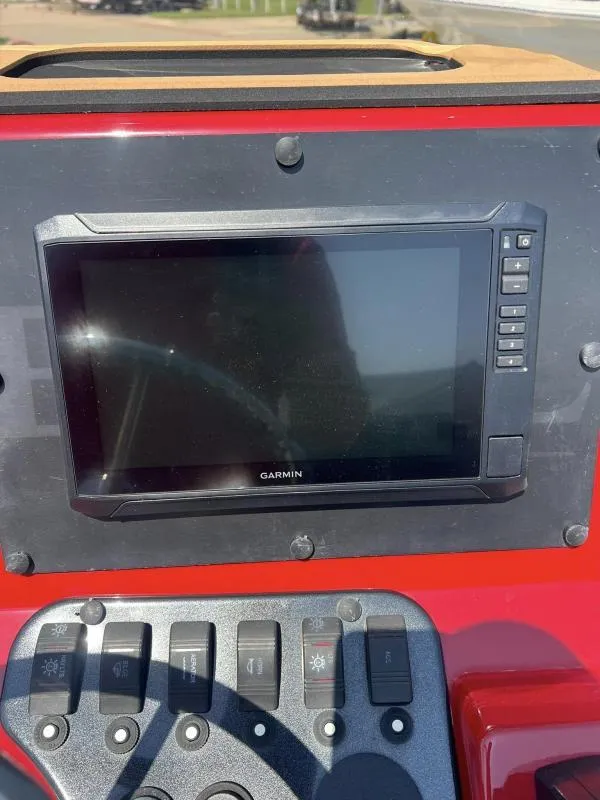 Slide: The Image of Garmin display and control panel on 2023 Excel Boats 220 Bay Pro. - 11