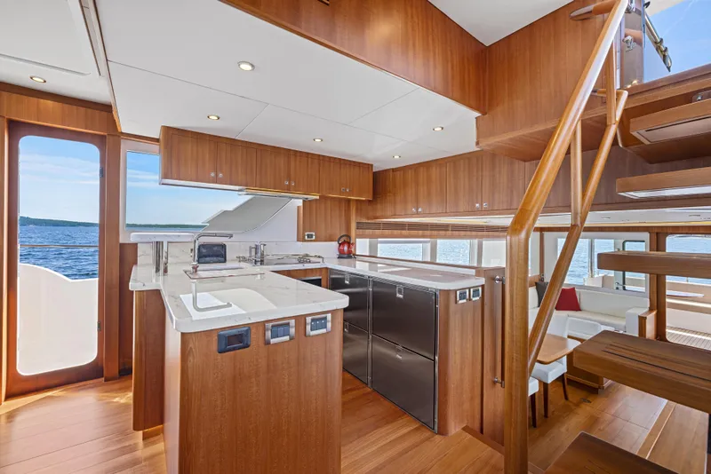 Slide: The Image of Luxurious interior of 2026 Selene 60 Ocean Explorer yacht with modern kitchen and ocean view. - 11