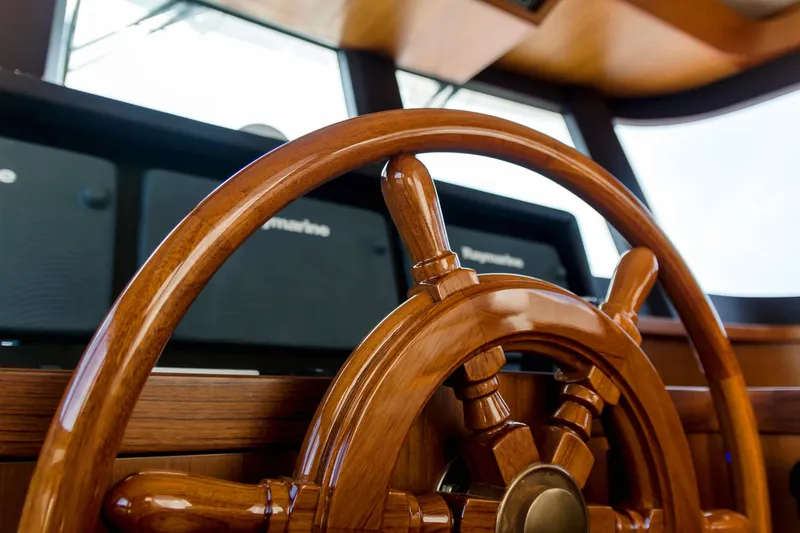 Slide: The Image of Wooden helm of 2026 Selene 60 Ocean Explorer yacht, showcasing elegant craftsmanship. - 17