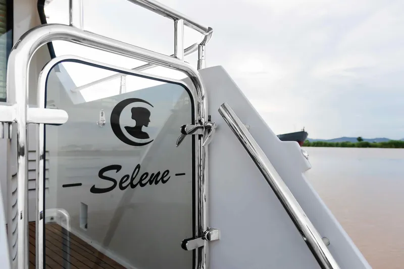 Slide: The Image of Selene 60 Ocean Explorer yacht, 2026 model, featuring sleek design and chrome details. - 23
