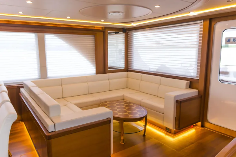 Slide: The Image of Luxurious interior of 2026 Selene 60 Ocean Explorer yacht with elegant seating and ambient lighting. - 4