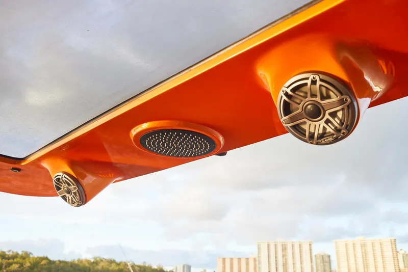 Slide: The Image of Orange canopy with speakers on a 2023 Midnight Express 43' Solstice boat. - 15