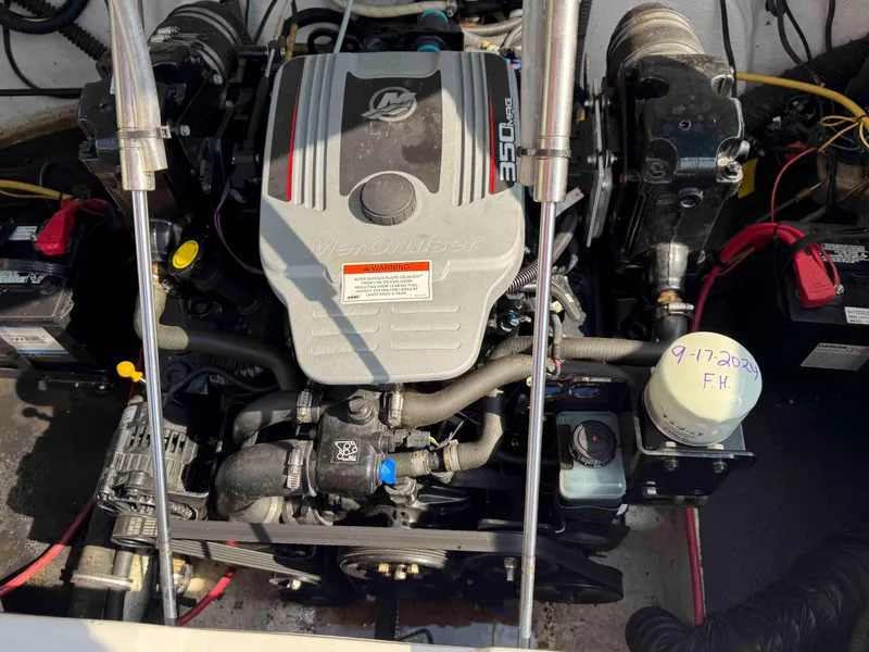 Slide: The Image of Engine compartment of a 2010 Crownline 240 LS boat with MerCruiser 350 MAG engine. - 13