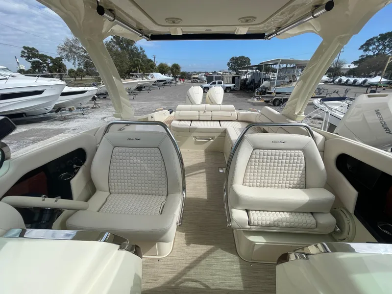 Slide: The Image of 2024 Chris-Craft Launch 31 GT luxury boat interior with plush seating and modern design. - 10