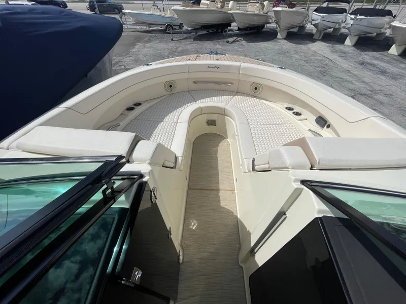 Slide: The Image of 2024 Chris-Craft Launch 31 GT boat interior with spacious seating and modern design. - 12