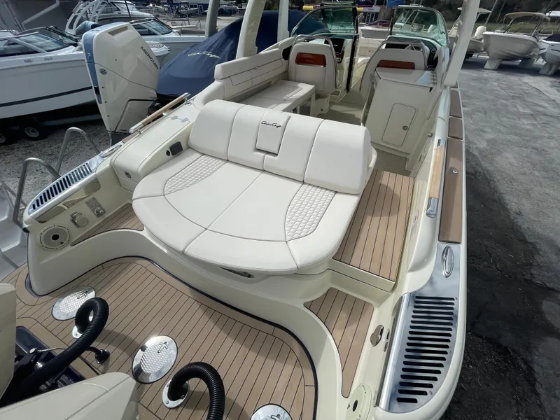 Slide: The Image of 2024 Chris-Craft Launch 31 GT boat with luxurious seating and teak flooring. - 3