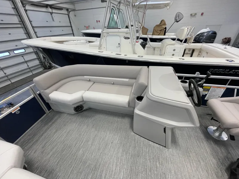Slide: The Image of 2024 Godfrey Xperience 1880 FX pontoon boat interior with seating and helm station. - 13