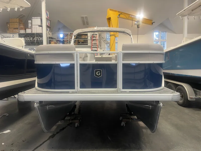 Slide: The Image of 2024 Godfrey Xperience 1880 FX pontoon boat in showroom. - 4