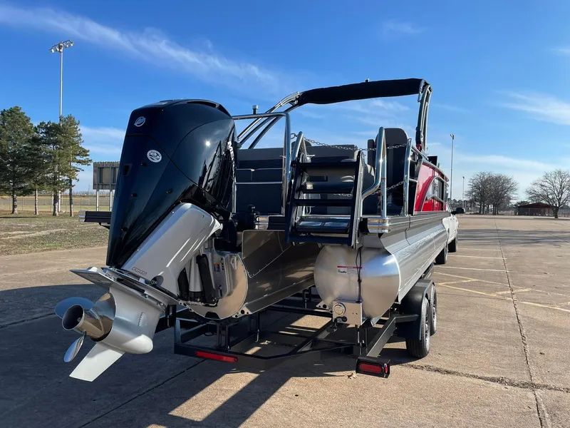 Slide: The Image of 2024 Barletta CORSA 23UCA pontoon boat on trailer, rear view. - 10