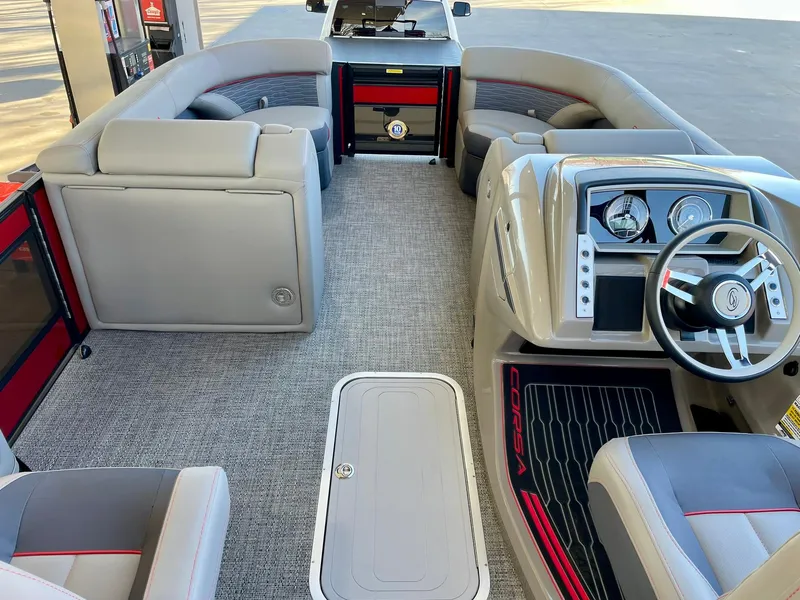 Slide: The Image of 2024 Barletta CORSA 23UCA boat interior with modern dashboard and comfortable seating. - 25