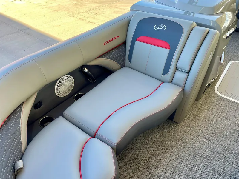 Slide: The Image of 2024 Barletta CORSA 23UCA boat interior with gray and red seating. - 33