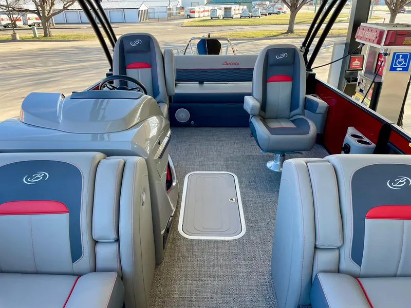 Slide: The Image of 2024 Barletta CORSA 23UCA pontoon boat interior with gray and red seating. - 34