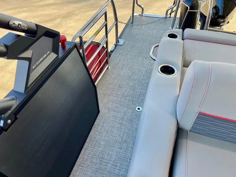 Slide: The Image of 2024 Barletta CORSA 23UCA boat interior with seating and railing. - 38