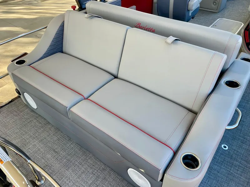 Slide: The Image of 2024 Barletta CORSA 23UCA boat seating with cup holders and premium upholstery. - 40