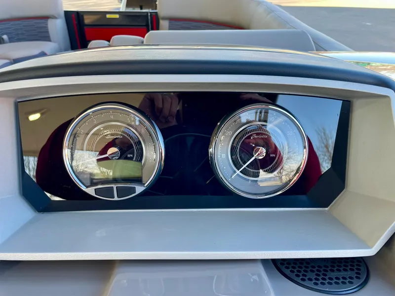 Slide: The Image of 2024 Barletta CORSA 23UCA dashboard with dual gauges and digital display. - 44