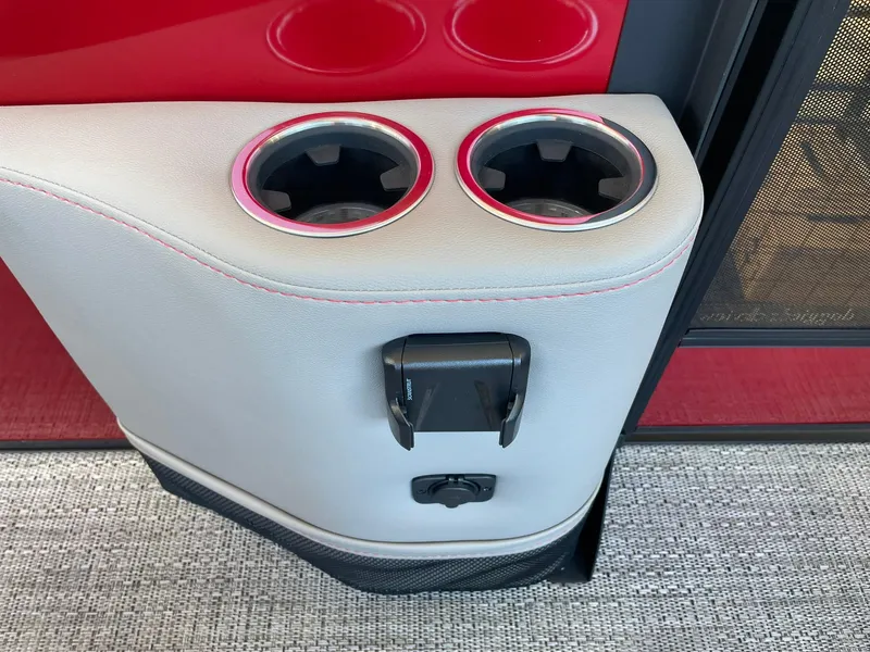 Slide: The Image of 2024 Barletta CORSA 23UCA cup holders and USB charging port. - 48