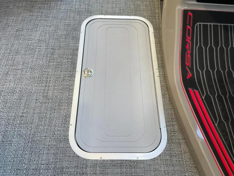 Slide: The Image of 2024 Barletta CORSA 23UCA floor hatch and logo detail. - 49