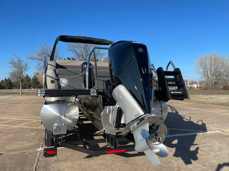 Slide: The Image of 2024 Barletta CORSA 23UCA pontoon boat with outboard motor, rear view. - 9