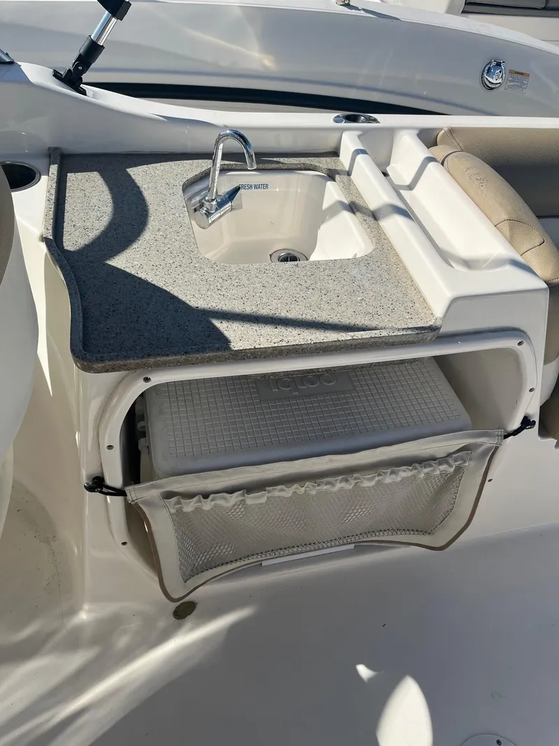 Slide: The Image of 2020 Key West 239 DFS boat with sink and storage compartment. - 8
