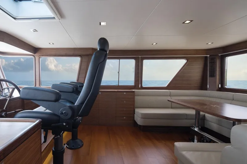 Slide: The Image of Interior of 2026 Selene 72 Classic Explorer yacht with luxurious seating and ocean view. - 14