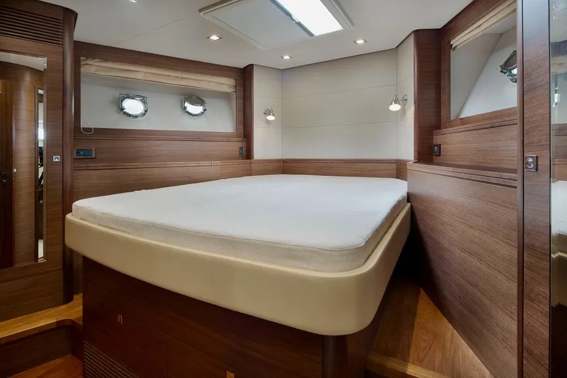 Slide: The Image of Luxurious cabin interior of 2026 Selene 72 Classic Explorer yacht, featuring elegant wood finishes. - 20