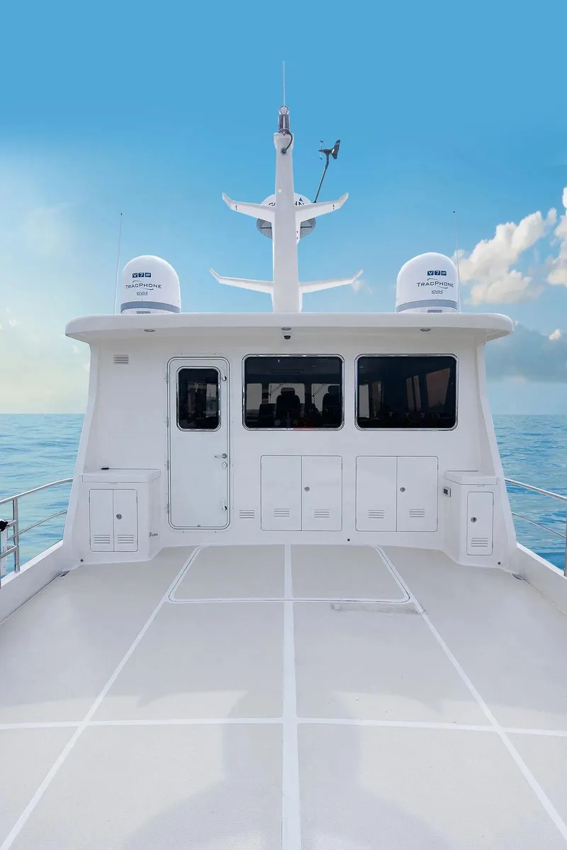 Slide: The Image of 2026 Selene 72 Classic Explorer yacht on calm sea under clear blue sky. - 4