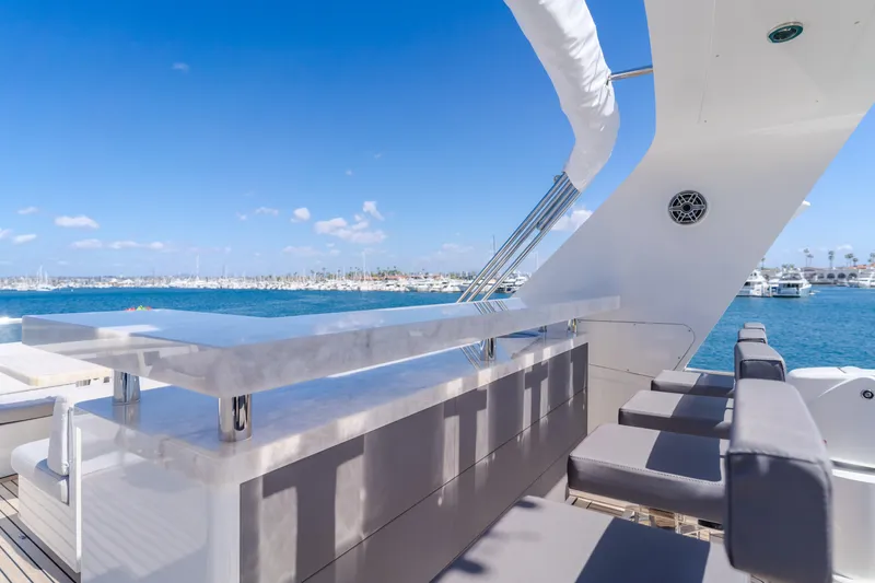Slide: The Image of Flybridge seating area on 2016 Van der Valk 78 Motor Yacht with ocean view. - 24