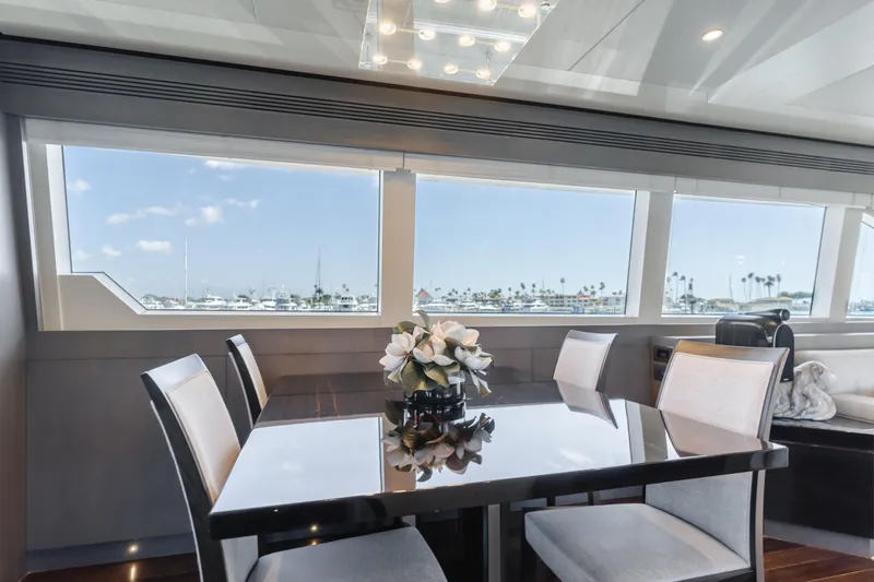 Slide: The Image of Luxurious dining area inside a 2016 Van der Valk 78 Flybridge Motor Yacht. - 34