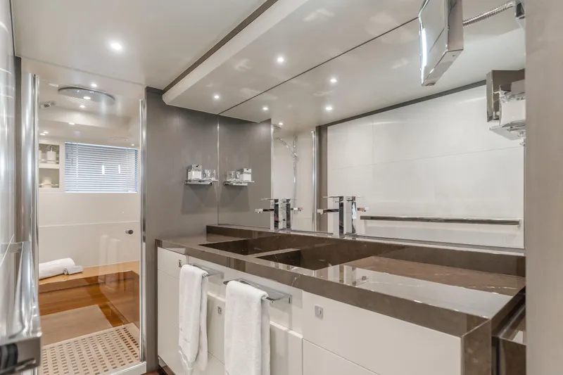 Slide: The Image of Luxurious bathroom in 2016 Van der Valk 78 Flybridge Motor Yacht with double sinks and modern fixtures. - 46