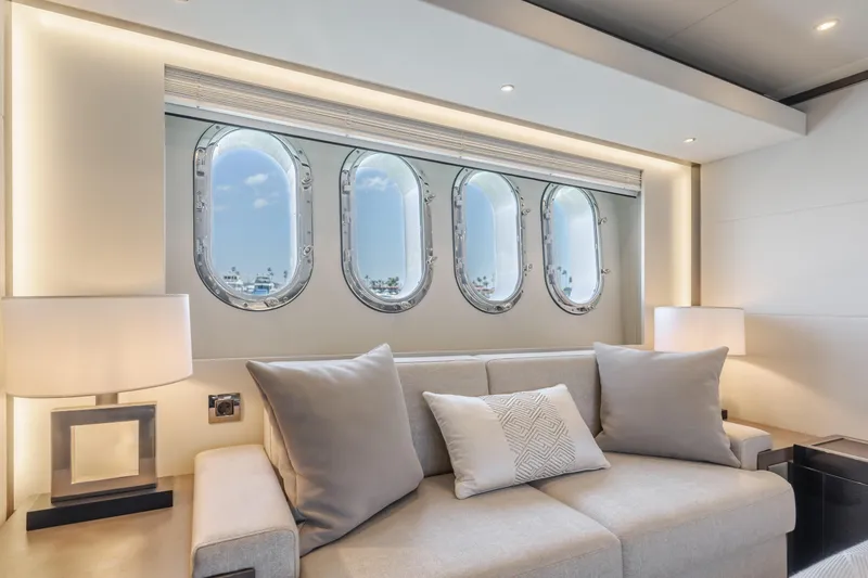 Slide: The Image of Luxurious interior of 2016 Van der Valk 78 Flybridge Motor Yacht with porthole windows. - 52