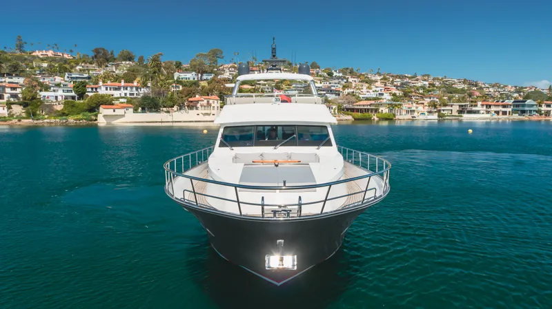 Slide: The Image of Front view of 2016 Van der Valk 78 Flybridge Motor Yacht on water. - 7