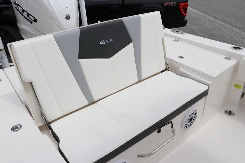 Slide: The Image of 2024 Robalo 266 Cayman boat seat with sleek design and integrated speaker. - 9