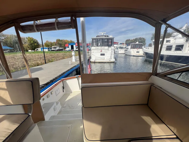 Slide: The Image of Interior view of 2000 Bruckmann Bluestar 29.9 yacht docked at marina. - 21