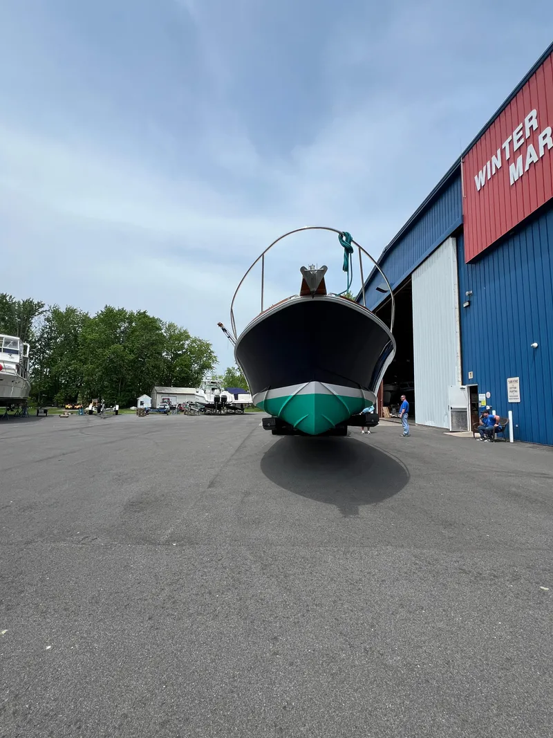 Slide: The Image of Bruckmann Bluestar 29.9 boat, 2000 model, outside Winter Marina. - 3