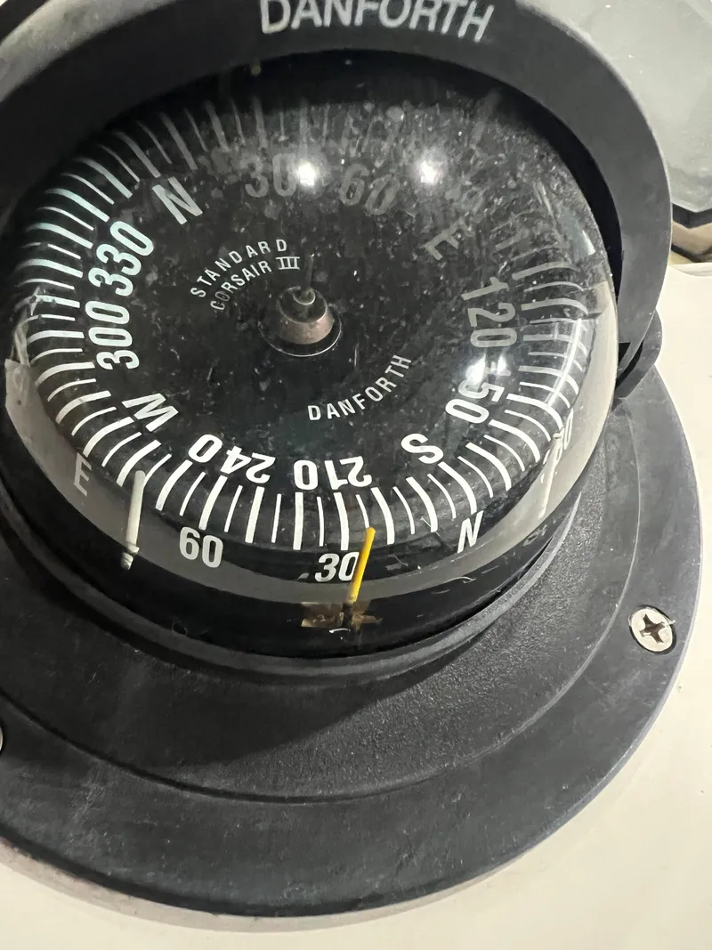 Slide: The Image of Danforth compass on a 2000 Bruckmann Bluestar 29.9 boat. - 39