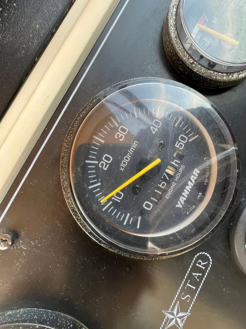 Slide: The Image of Close-up of a Yanmar tachometer on a 2000 Bruckmann Bluestar 29.9 boat. - 40
