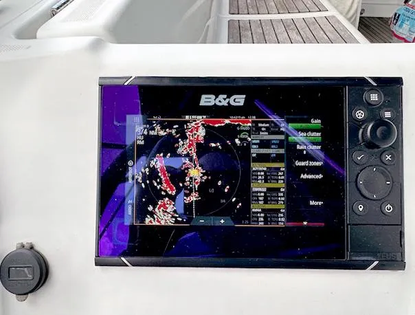 Slide: The Image of Navigation system on a 2019 Beneteau Oceanis 48 sailboat displaying radar data. - 17