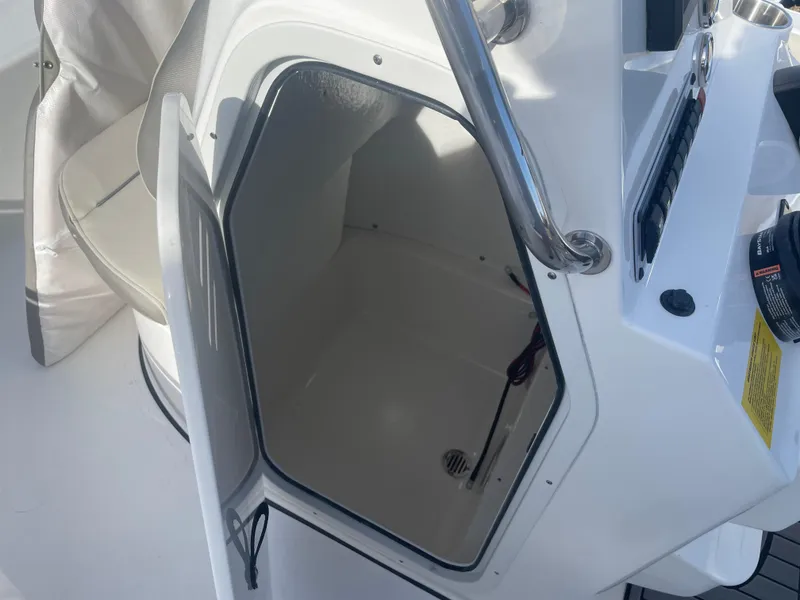 Slide: The Image of 2024 Key West 189 FS boat storage compartment. - 11