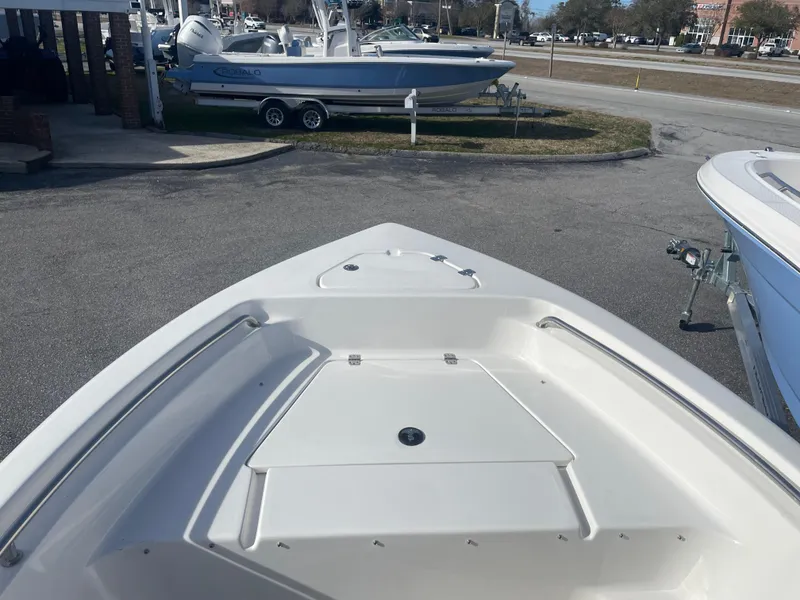Slide: The Image of 2024 Key West 189 FS boat bow view in a parking lot. - 15