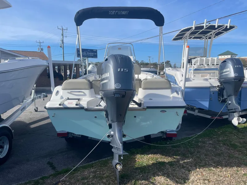 Slide: The Image of 2024 Key West 189 FS boat with Yamaha 115 engine, displayed outdoors. - 3
