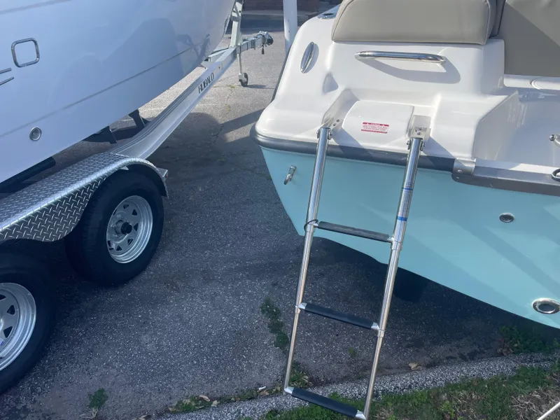 Slide: The Image of 2024 Key West 189 FS boat with ladder and trailer. - 4