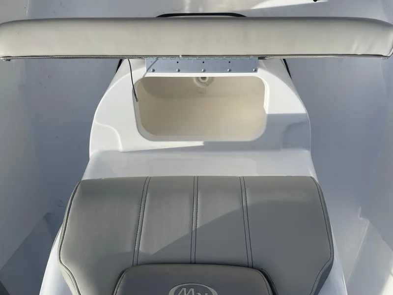 Slide: The Image of 2024 Key West 189 FS boat seat and storage compartment. - 13