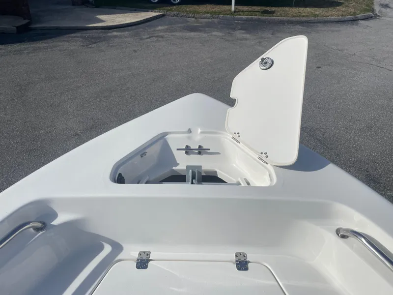 Slide: The Image of 2024 Key West 189 FS boat with open storage compartment. - 17