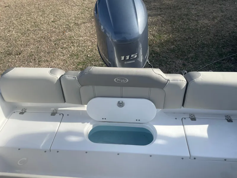 Slide: The Image of 2024 Key West 189 FS boat with Yamaha 115 engine, rear seating and livewell. - 9