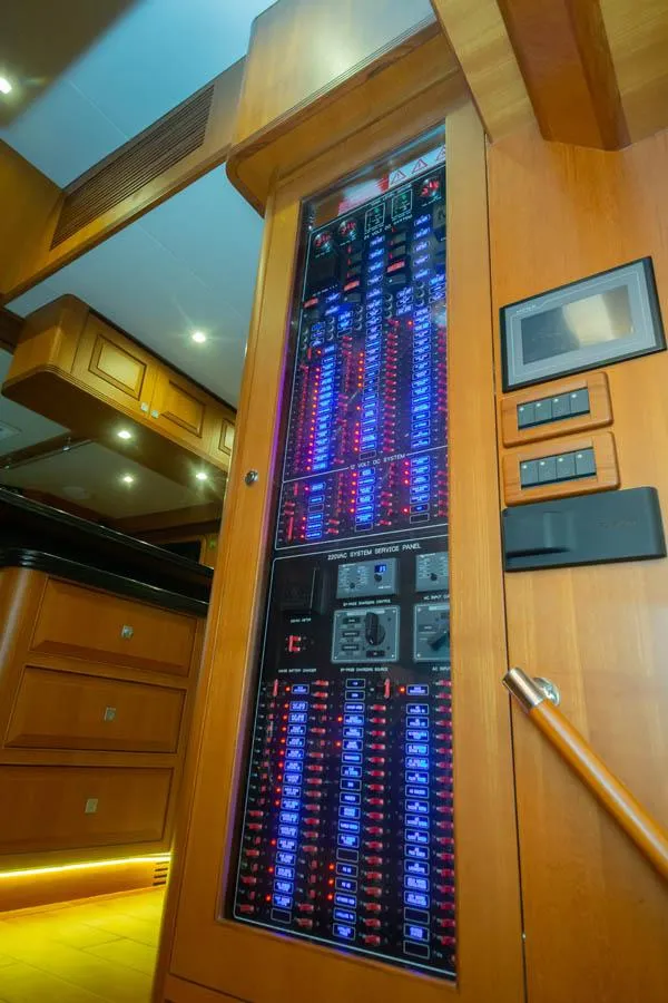 Slide: The Image of Electrical control panel inside 2026 Selene 60 Classic Explorer yacht, featuring illuminated switches and displays. - 10
