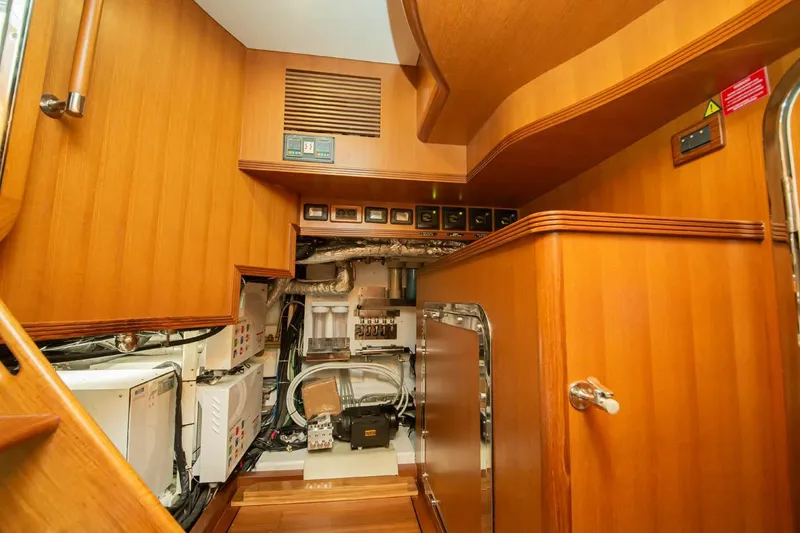 Slide: The Image of Engine room of 2026 Selene 60 Classic Explorer yacht with wooden paneling and equipment. - 18