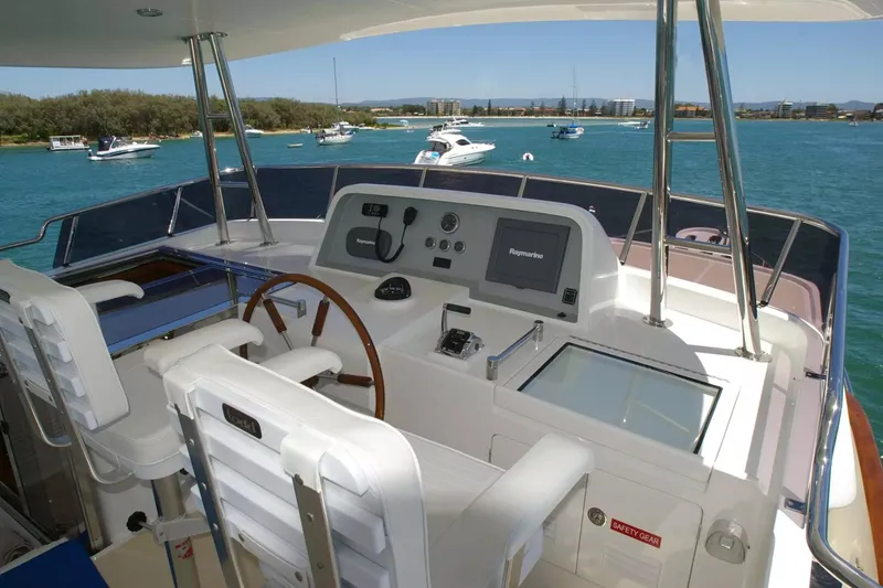Slide: The Image of Helm of 2026 Selene 60 Classic Explorer yacht with ocean view and modern controls. - 22