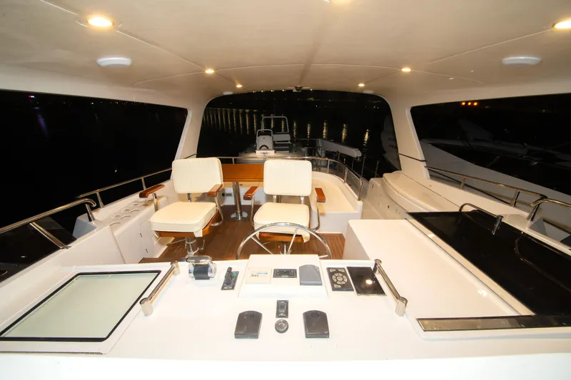 Slide: The Image of Luxurious 2026 Selene 60 Classic Explorer yacht interior with modern seating and controls. - 26